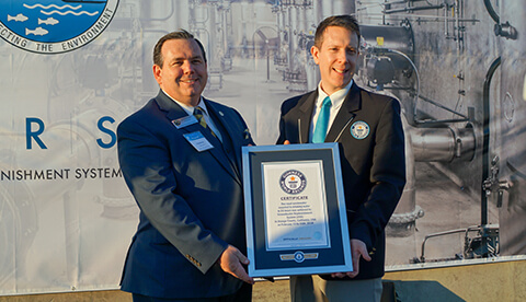 OCSD Board Chairman and GWRS Steering Committee Vice-Chair Greg Seabourn with official Guinness World Records adjudicator